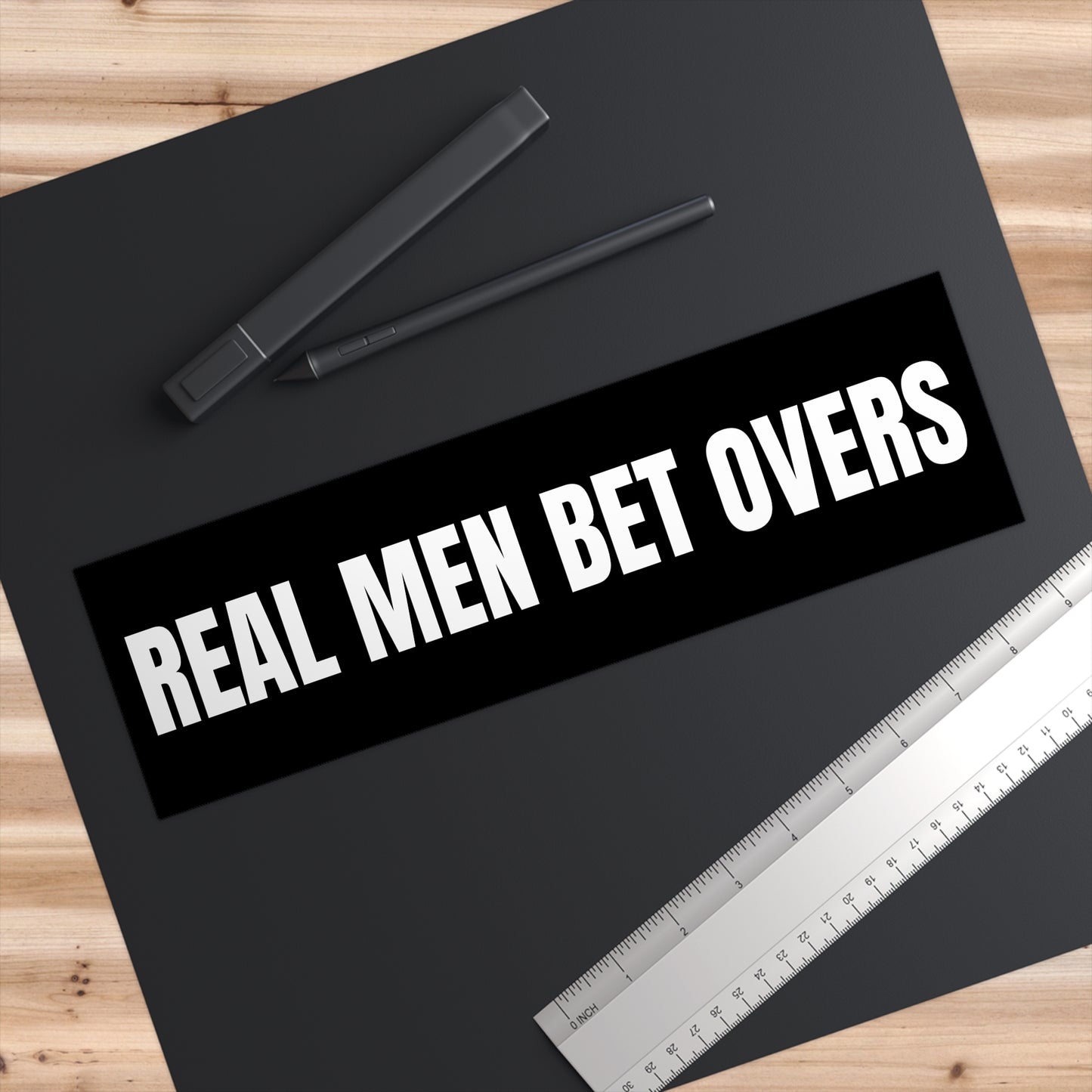 Real Men Bet Overs Bumper Sticker – Funny and Bold Sports Betting Decal